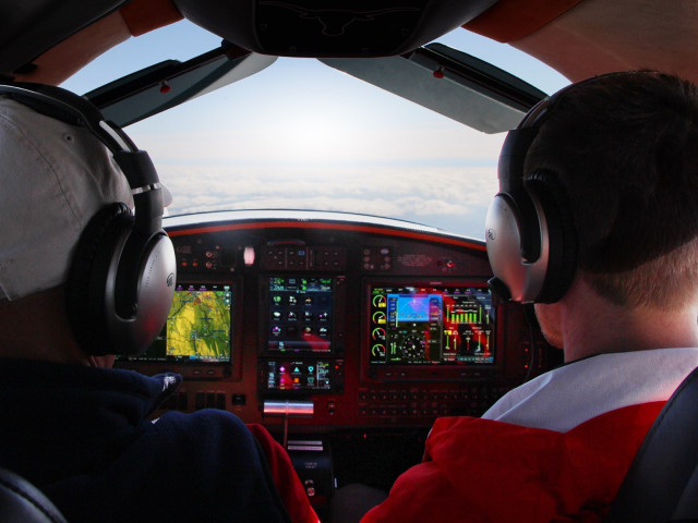 Two People in a Plane Cockpit